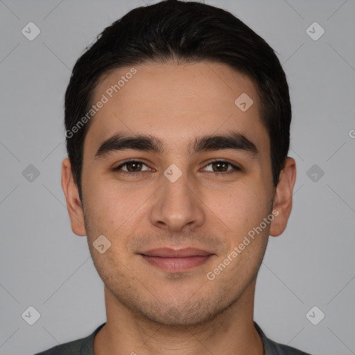 Joyful white young-adult male with short  brown hair and brown eyes