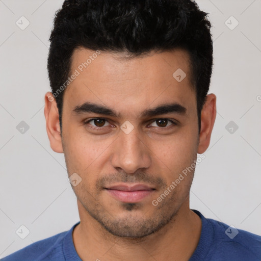 Joyful white young-adult male with short  black hair and brown eyes