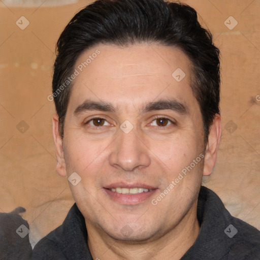 Joyful white adult male with short  brown hair and brown eyes