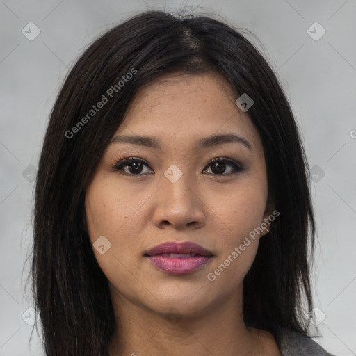 Joyful asian young-adult female with long  brown hair and brown eyes