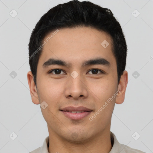 Joyful asian young-adult male with short  black hair and brown eyes