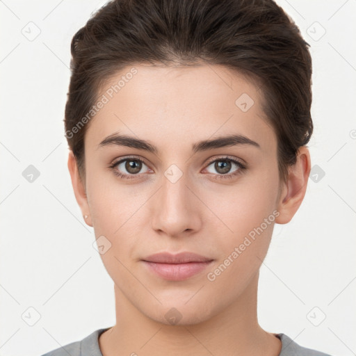 Neutral white young-adult female with short  brown hair and brown eyes