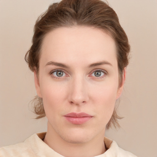 Neutral white young-adult female with medium  brown hair and blue eyes