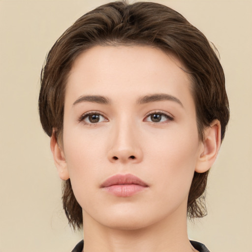 Neutral white young-adult female with medium  brown hair and brown eyes