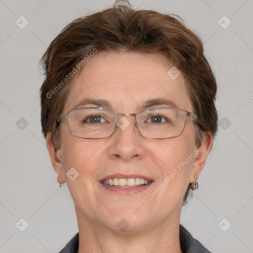 Joyful white adult female with short  brown hair and grey eyes