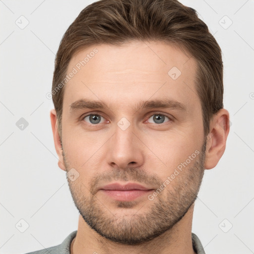 Neutral white young-adult male with short  brown hair and grey eyes