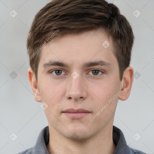 Neutral white young-adult male with short  brown hair and grey eyes