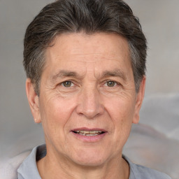 Joyful white middle-aged male with short  brown hair and brown eyes