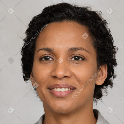 Joyful latino young-adult female with short  brown hair and brown eyes