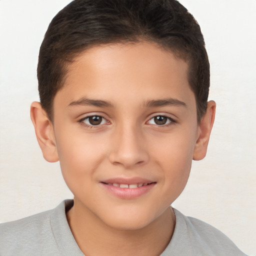 Joyful white child female with short  brown hair and brown eyes