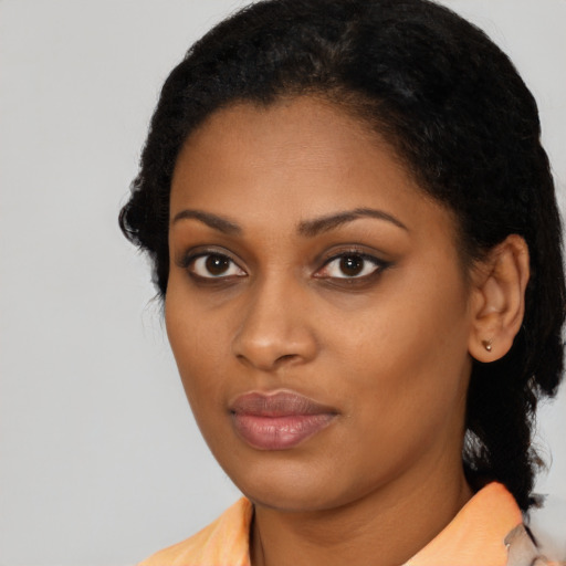 Neutral latino young-adult female with medium  black hair and brown eyes