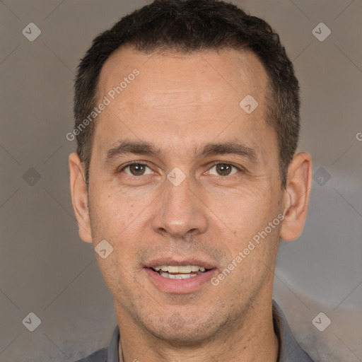 Joyful white adult male with short  brown hair and brown eyes