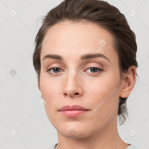 Neutral white young-adult female with medium  brown hair and brown eyes