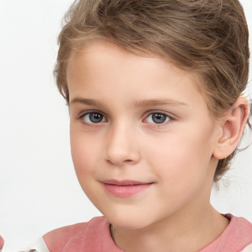 Joyful white child female with short  brown hair and brown eyes