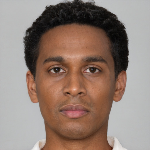 Neutral black young-adult male with short  black hair and brown eyes