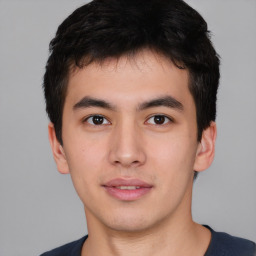 Neutral asian young-adult male with short  brown hair and brown eyes