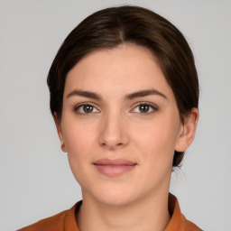 Neutral white young-adult female with short  brown hair and brown eyes