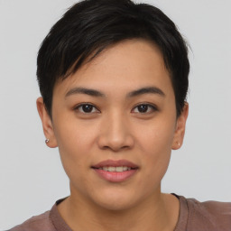 Joyful asian young-adult female with short  black hair and brown eyes