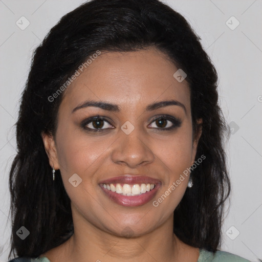 Joyful latino young-adult female with long  brown hair and brown eyes