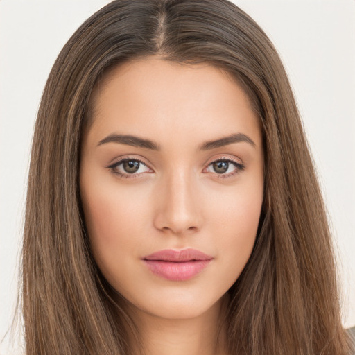 Neutral white young-adult female with long  brown hair and brown eyes