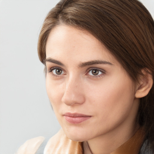 Neutral white young-adult female with long  brown hair and brown eyes