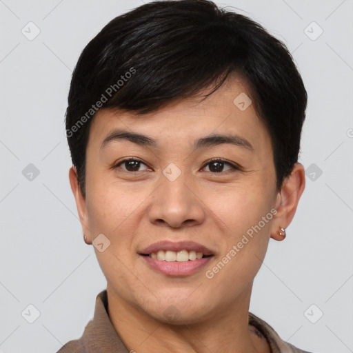 Joyful asian young-adult female with short  brown hair and brown eyes