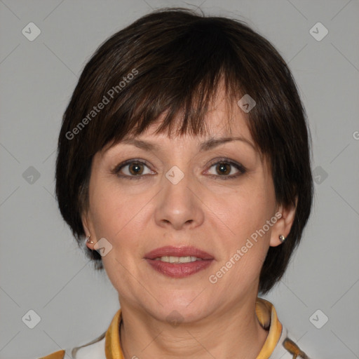 Joyful white adult female with medium  brown hair and brown eyes