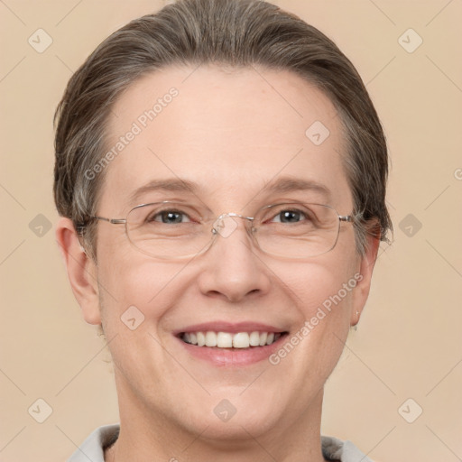 Joyful white adult female with short  brown hair and grey eyes