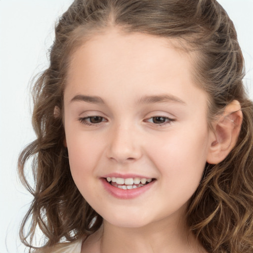 Joyful white child female with long  brown hair and brown eyes