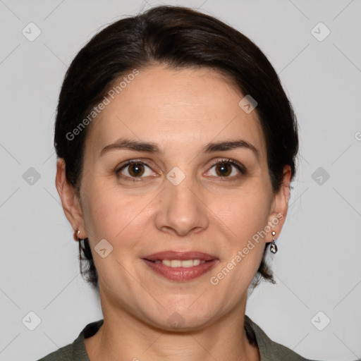 Joyful white adult female with medium  brown hair and brown eyes