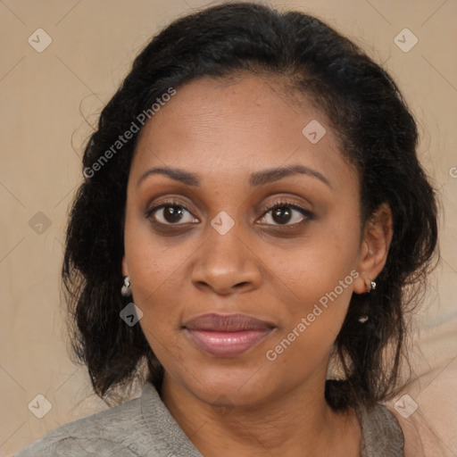 Joyful black young-adult female with medium  brown hair and brown eyes