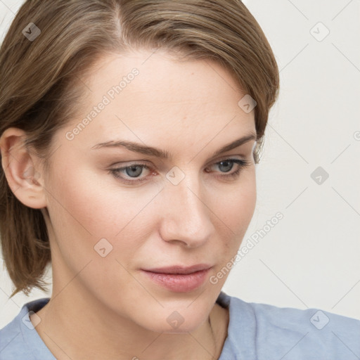 Joyful white young-adult female with medium  brown hair and blue eyes