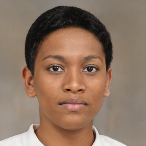 Joyful black young-adult female with short  black hair and brown eyes