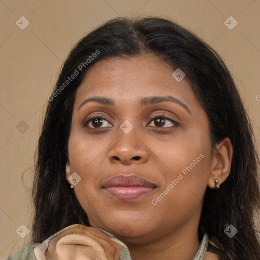 Joyful latino young-adult female with long  brown hair and brown eyes