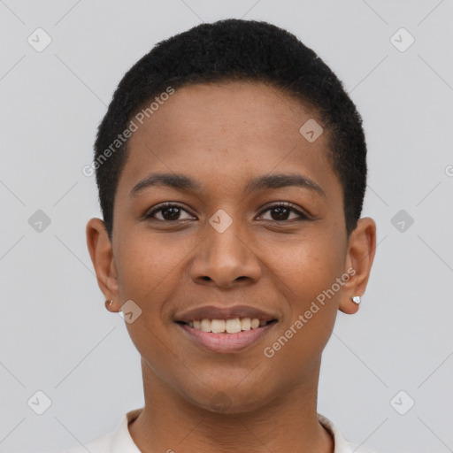 Joyful black young-adult female with short  black hair and brown eyes