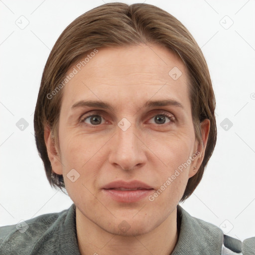 Joyful white adult female with medium  brown hair and grey eyes