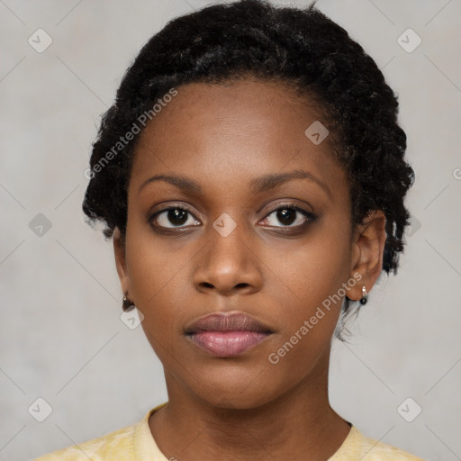 Neutral black young-adult female with short  black hair and brown eyes