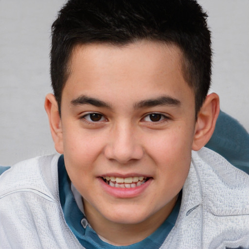 Joyful white child male with short  brown hair and brown eyes