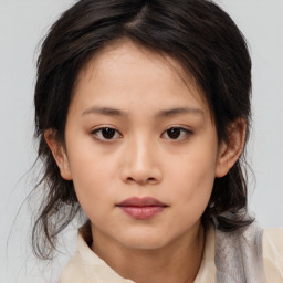 Neutral asian young-adult female with medium  brown hair and brown eyes