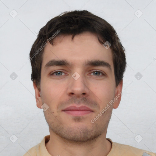 Neutral white young-adult male with short  brown hair and brown eyes