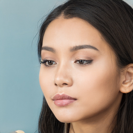 Neutral asian young-adult female with long  brown hair and brown eyes