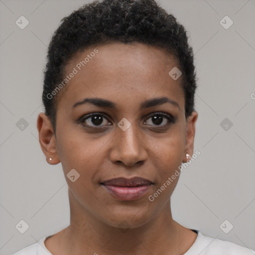 Joyful black young-adult female with short  brown hair and brown eyes