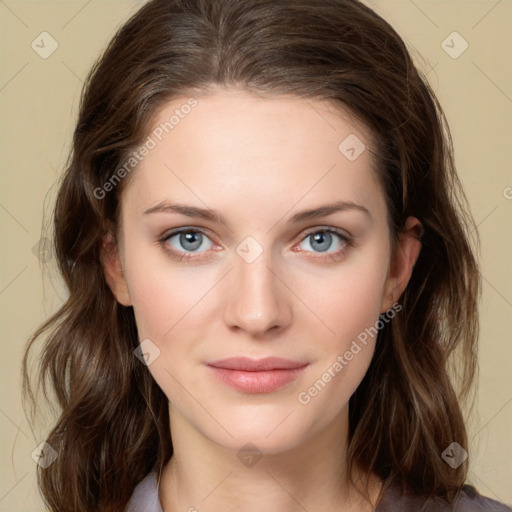 Joyful white young-adult female with medium  brown hair and green eyes