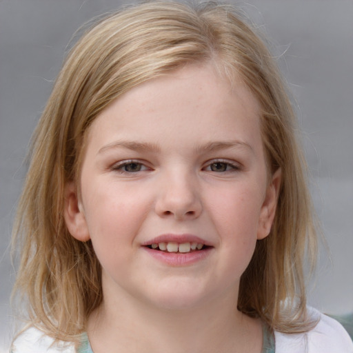 Joyful white child female with medium  brown hair and blue eyes