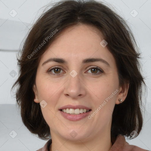 Joyful white adult female with medium  brown hair and brown eyes