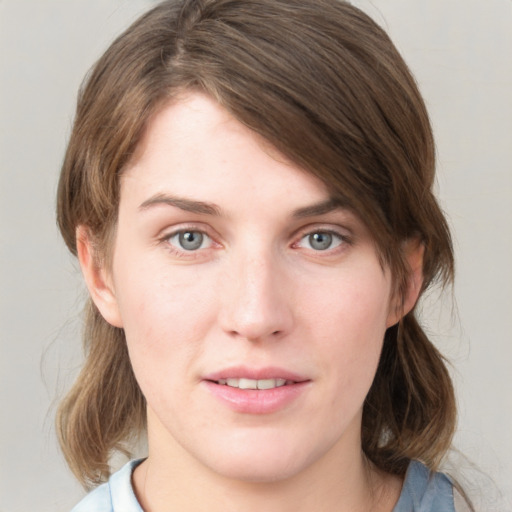 Neutral white young-adult female with medium  brown hair and blue eyes