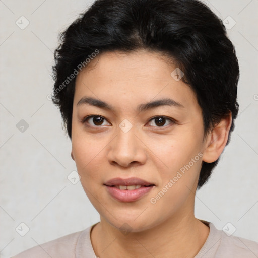 Joyful asian young-adult female with short  black hair and brown eyes