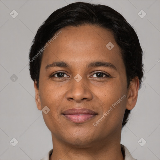 Joyful latino young-adult male with short  brown hair and brown eyes