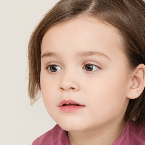 Neutral white child female with long  brown hair and brown eyes