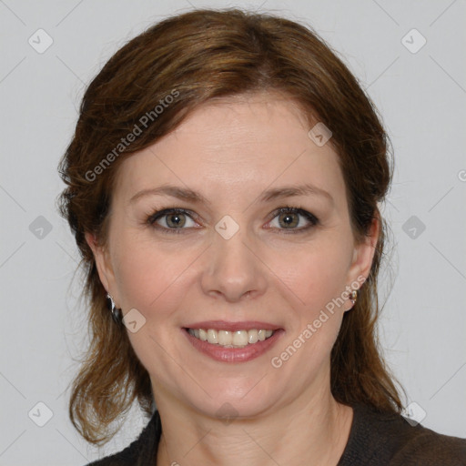 Joyful white young-adult female with medium  brown hair and blue eyes